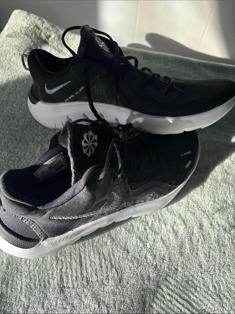 Nike Black and White Running Sneakers with Subtle Stitch Detail
